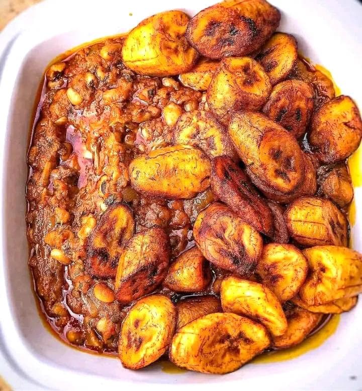 Mouth watering beans stew served with ripe plantain.