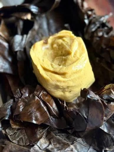 Ghanaian staple swallow food made from fermented corn dough.